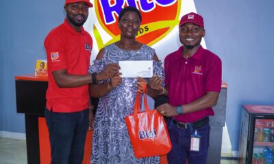 From Left: Adedotun Ajibade, Media and Insights Manager, Rite Foods Limited; with Olayiwola Temitope Mercy, the lucky winner of N100,000 cash, sausage rolls, and merchandise in Bigi Beef and Rite Spicy Beef Sausage Rolls spiced up April Fools' Day social media contest “Why Did the Bull Cross the Road?”; and Olawale Odenusi, Digital Lead, Rite Foods Limited; at the company’s head office in Ikeja, Lagos, on 1st of April 2024.