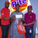 From Left: Adedotun Ajibade, Media and Insights Manager, Rite Foods Limited; with Olayiwola Temitope Mercy, the lucky winner of N100,000 cash, sausage rolls, and merchandise in Bigi Beef and Rite Spicy Beef Sausage Rolls spiced up April Fools' Day social media contest “Why Did the Bull Cross the Road?”; and Olawale Odenusi, Digital Lead, Rite Foods Limited; at the company’s head office in Ikeja, Lagos, on 1st of April 2024.